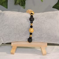 DSCN0980 Bracelet perles de métal noires et dorées