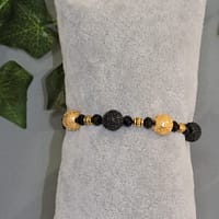 DSCN0983 Bracelet perles de métal noires et dorées
