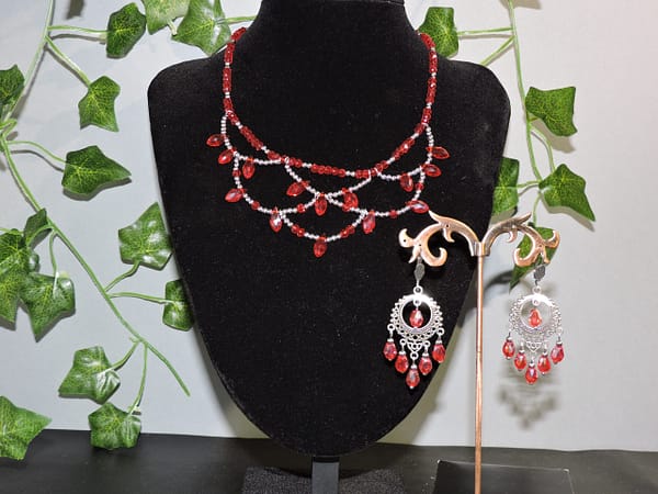 Parure collier et boucle d'oreille cristal rouge