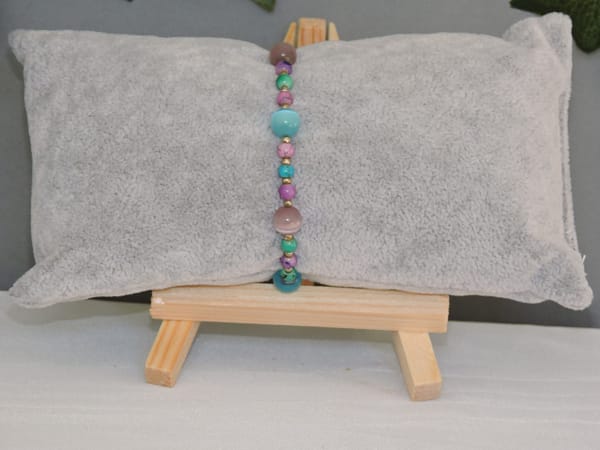 DSCN1016 Bracelet perles oeil de chat mauve et turquoise