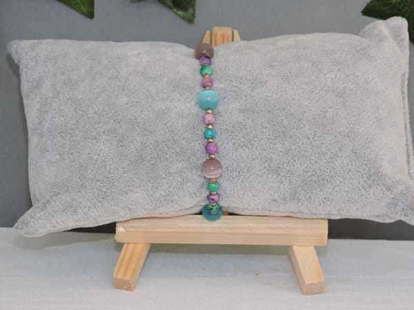 DSCN1017 Bracelet perles oeil de chat mauve et turquoise