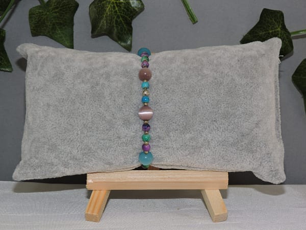 DSCN1023 Bracelet perles oeil de chat mauve et turquoise